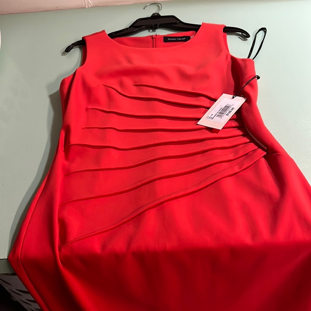 This is a MUST have woman’s dress
